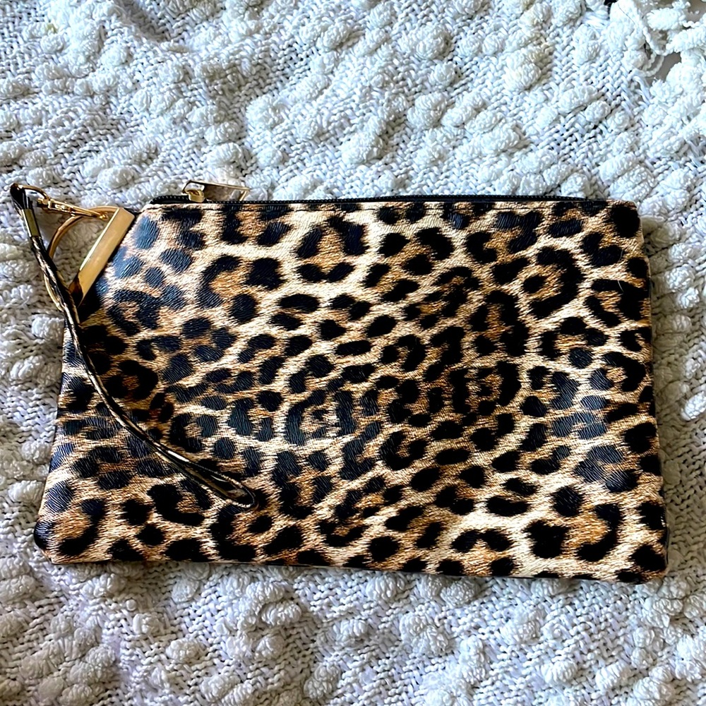 Cute cheetah wristlet with gold detail!